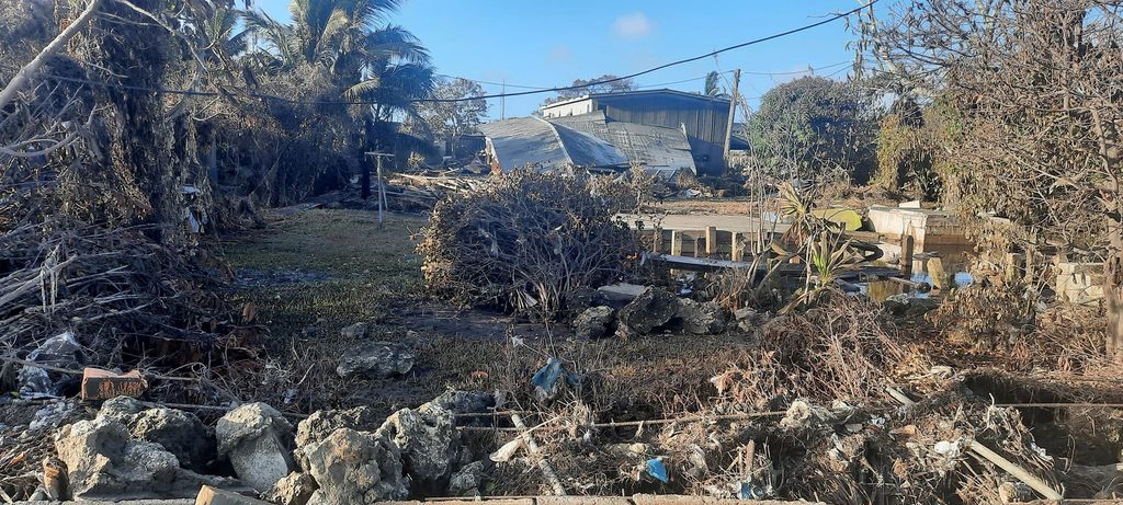 A general view shows damaged buildings following volcanic eruption and tsunami, in Nuku'alofa, Tonga in this picture obtained from social media on January 20, 2022. Courtesy of Marian Kupu/Broadcom Broadcasting FM87.5/via REUTERS THIS IMAGE HAS BEEN SUPPLIED BY A THIRD PARTY. MANDATORY CREDIT.