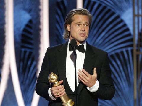 This image released by NBC shows Brad Pitt accepting the award for best supporting actor in a film for his role in 