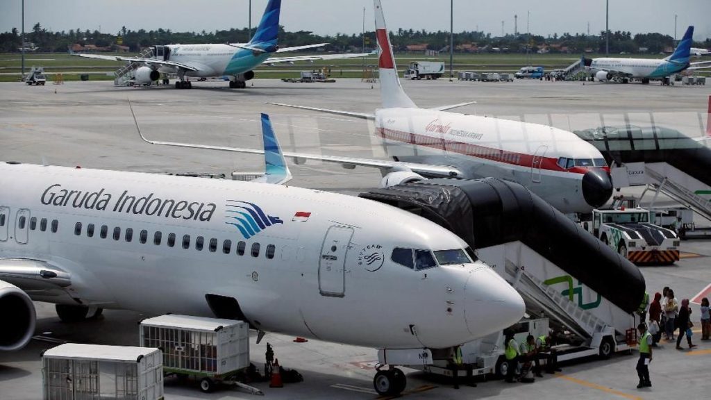 Hore! Naik Pesawat Garuda Indonesia Tak Wajib Pakai Masker
