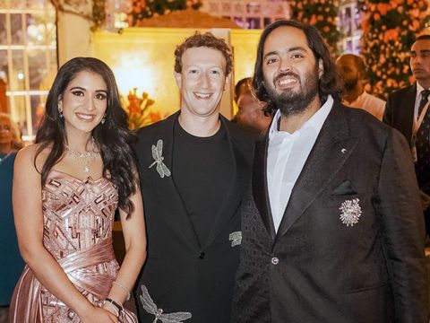 This photograph released by the Reliance group shows Mark Zuckerberg, center, posing for a photograph with   billionaire industrialist Mukesh Ambani's son Anant Ambani, right, and Radhika Merchant at their pre-wedding bash in Jamnagar, India, Saturday, Mar. 02, 2024. (Reliance group via AP)