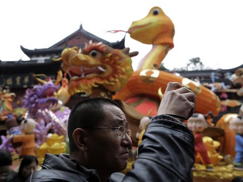 (AP Photo/Eugene Hoshiko)